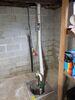 Basement Radon Mitigation System with Sump and Crack Sealing - Photo 2