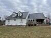 A Bold New Look: Black Metal Roofing & White Hardie Siding in Phoenixville - Photo 1