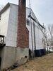 CertainTeed Vinyl Cedar Siding Installed in Lincolndale, NY | Siding Contractor - Photo 4