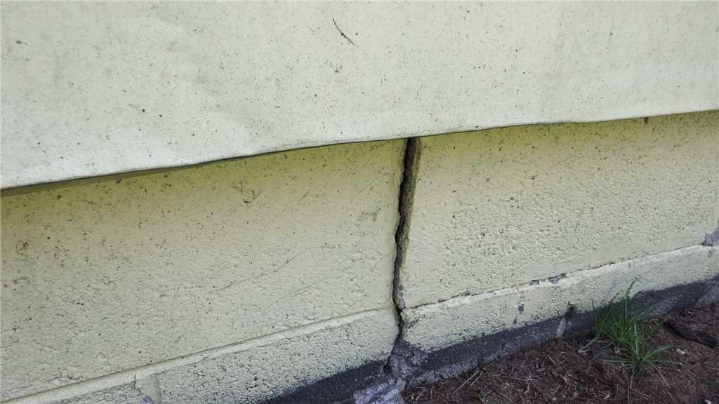 Foundation Repair Fixing a Bowing, Leaking Basement in Kalkaska, MI