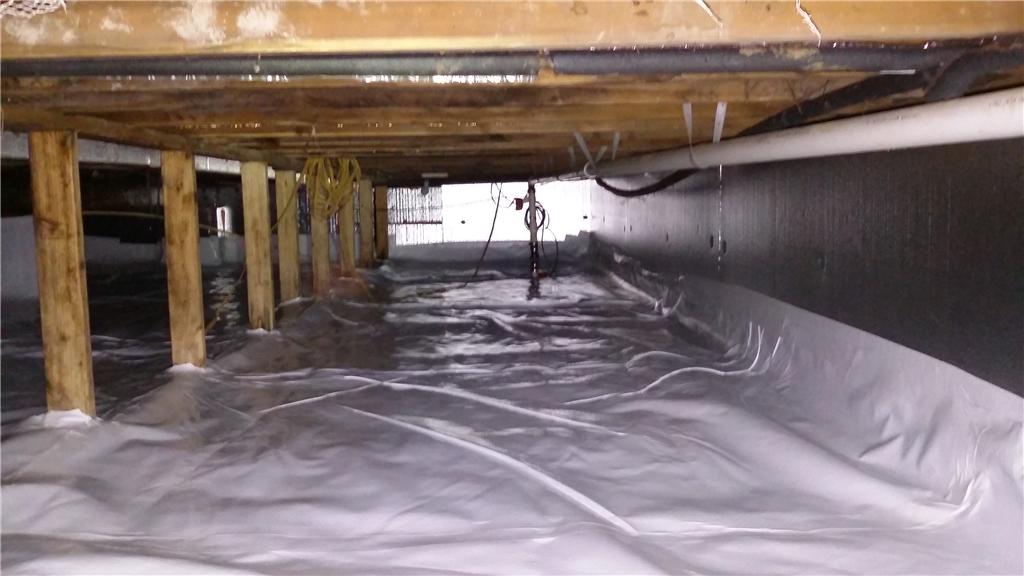 Crawl Space Repair - Creepy Crawl Space Repaired in Rives Junction, MI Vapor Barrier Under Pier And Beam
