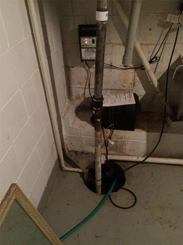 Foundation Repair Failing Foundation Fixed in Williamston, MI Old Sump Pump