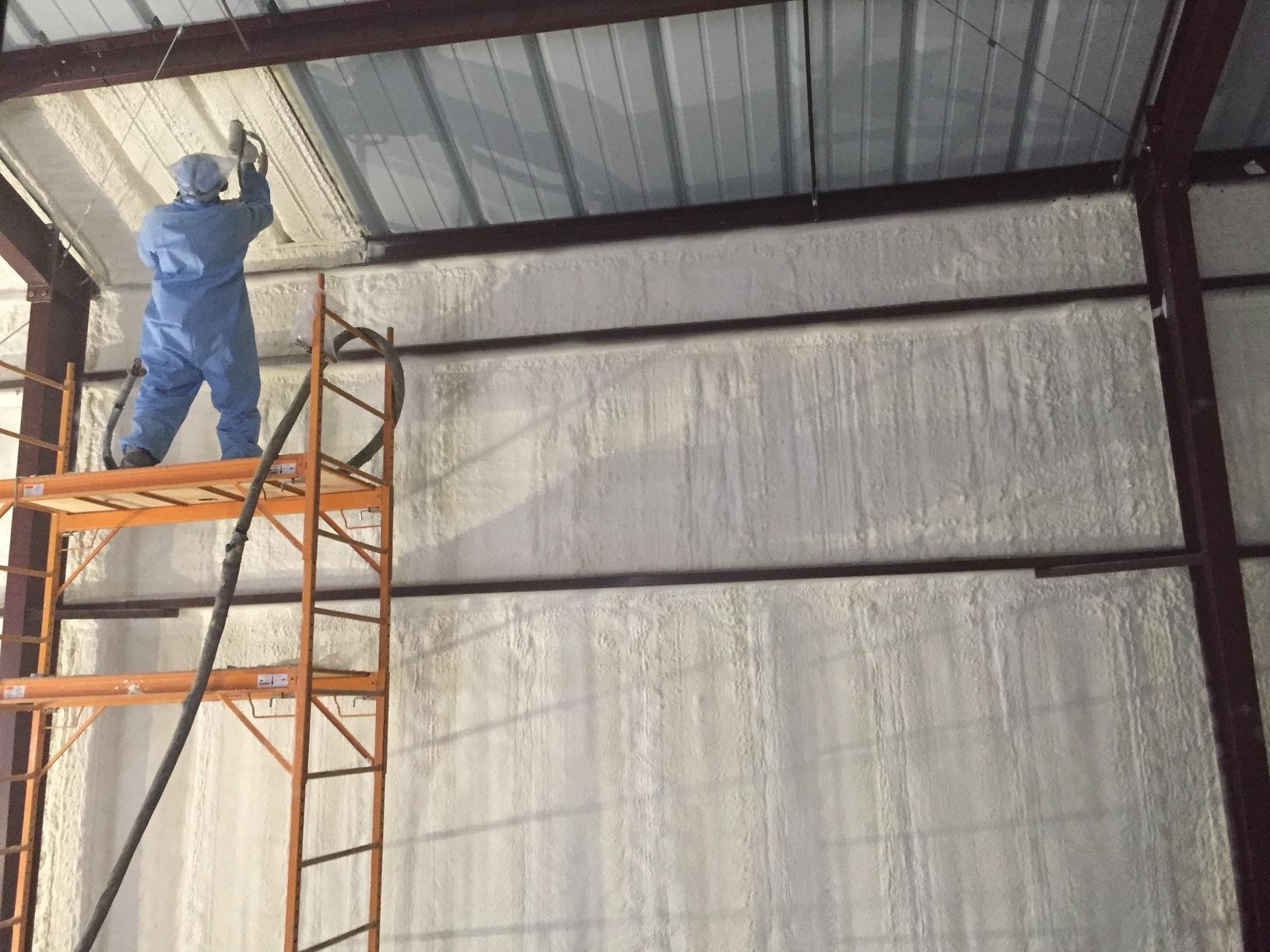 Insulating the Dia Art Foundation in Beacon, NY Spraying in the warehouse