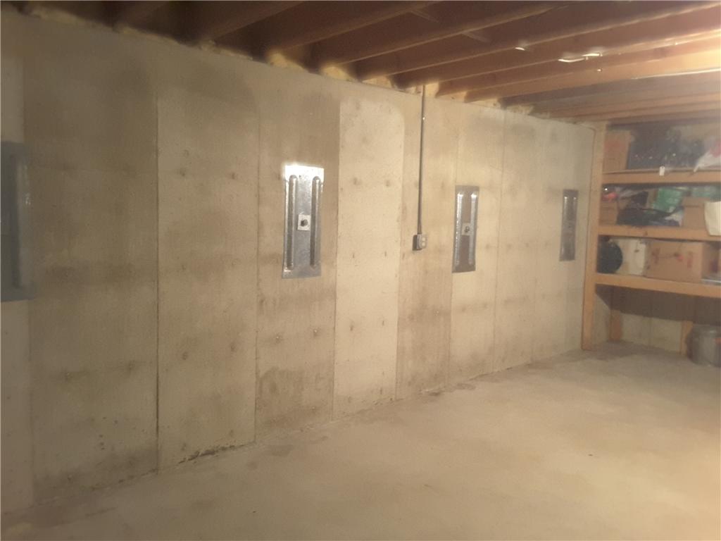 Foundation Repair Wall Anchors Secure Bowing Basement Wall in