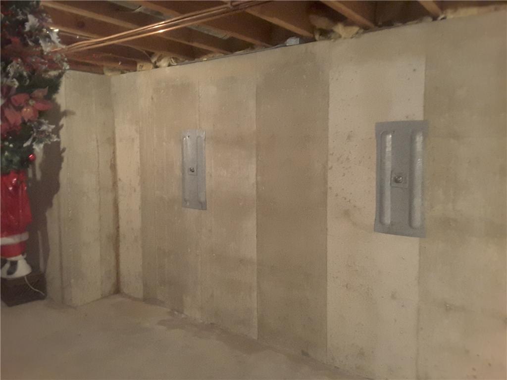 Foundation Repair Wall Anchors Secure Bowing Basement Wall in