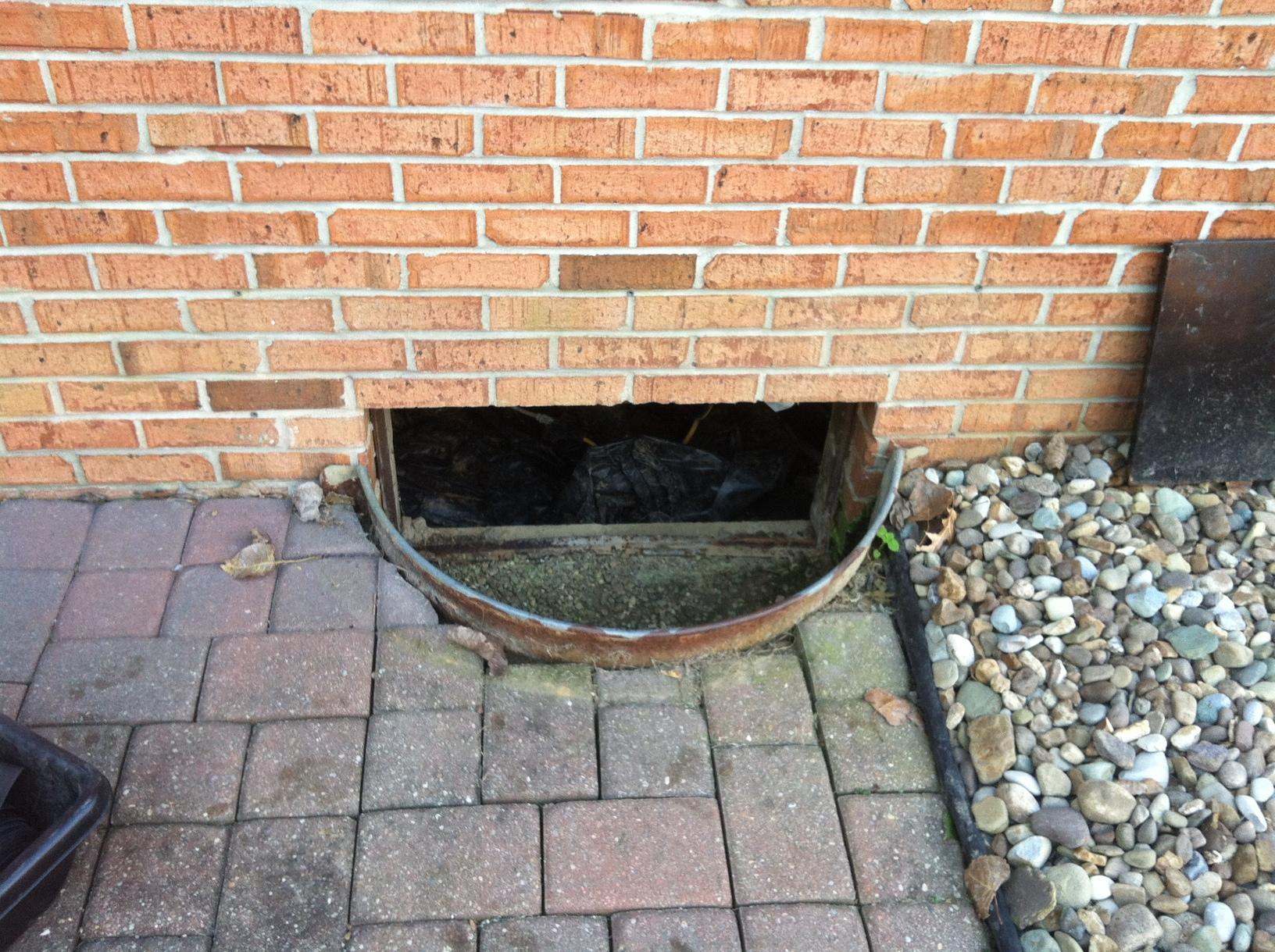 Crawl Space Repair CleanSpace Installation in Newburgh, IN Rusted out Window Wells from
