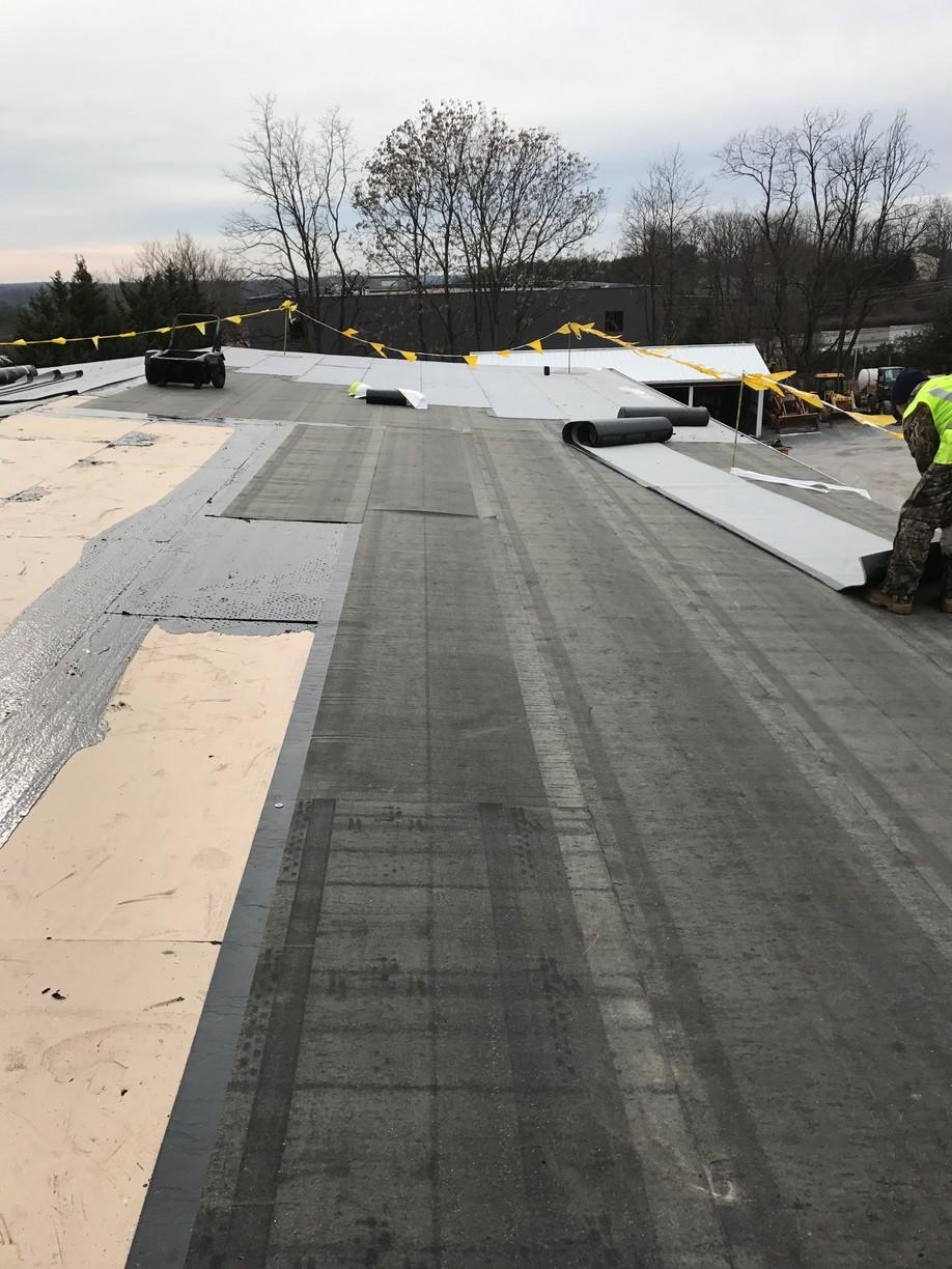Flat Roof Replacement in Germantown, MD Process Next Clean Deck to