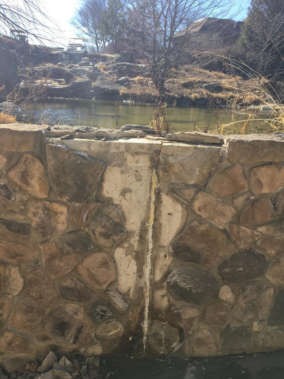 Crack injection for a retention pond's retaining wall in Hamburg NJ