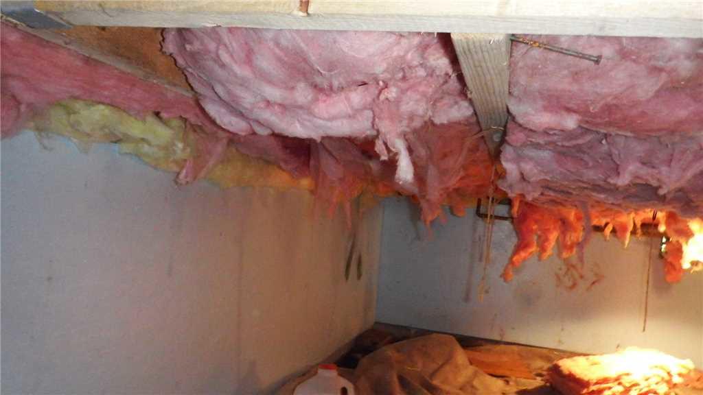 Crawl Space Repair Encapsulating a Wet Crawl Space in Traverse City, MI Falling Fiberglass