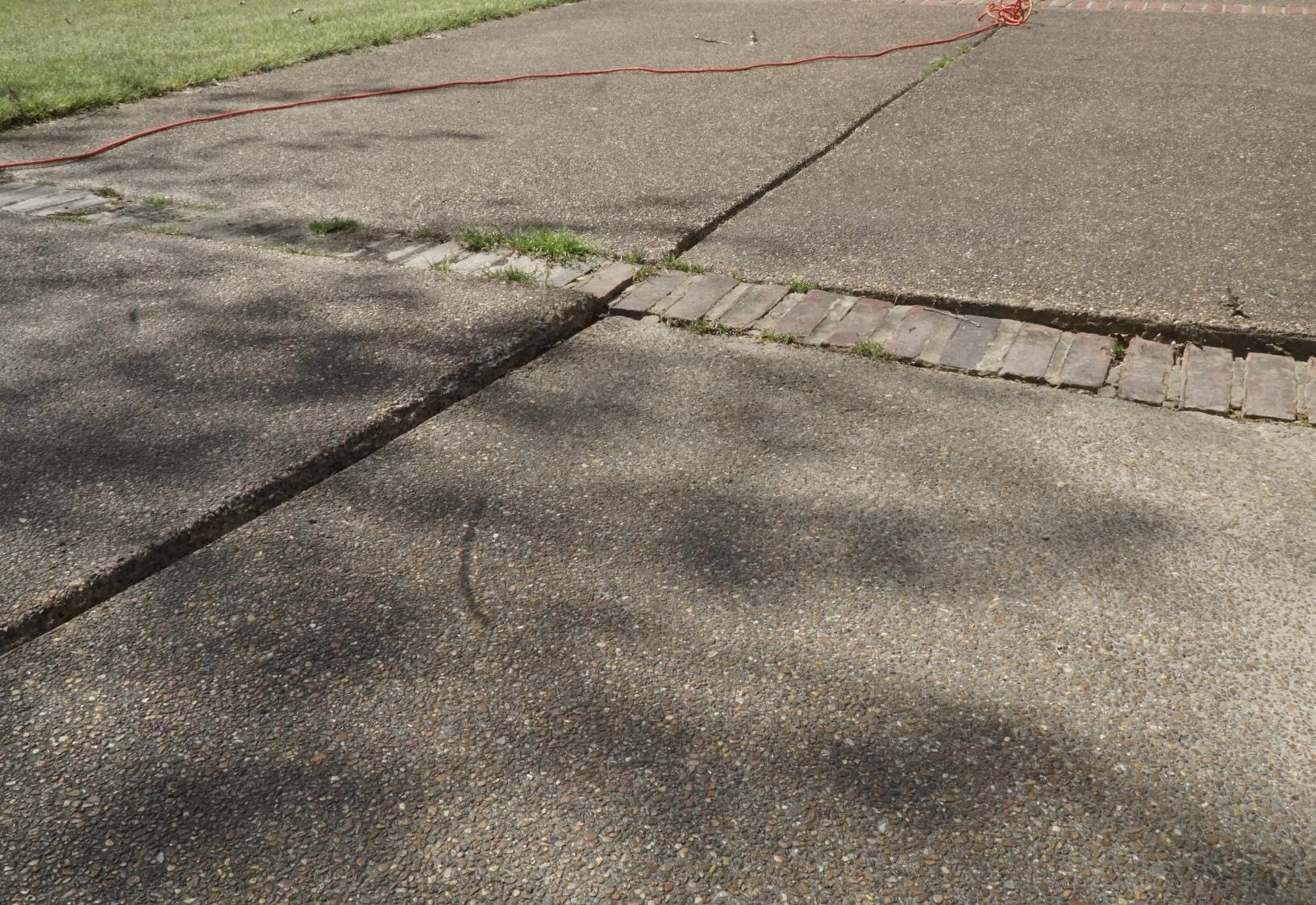 Concrete Leveling Concrete driveway lift in Eads, TN Before sunken