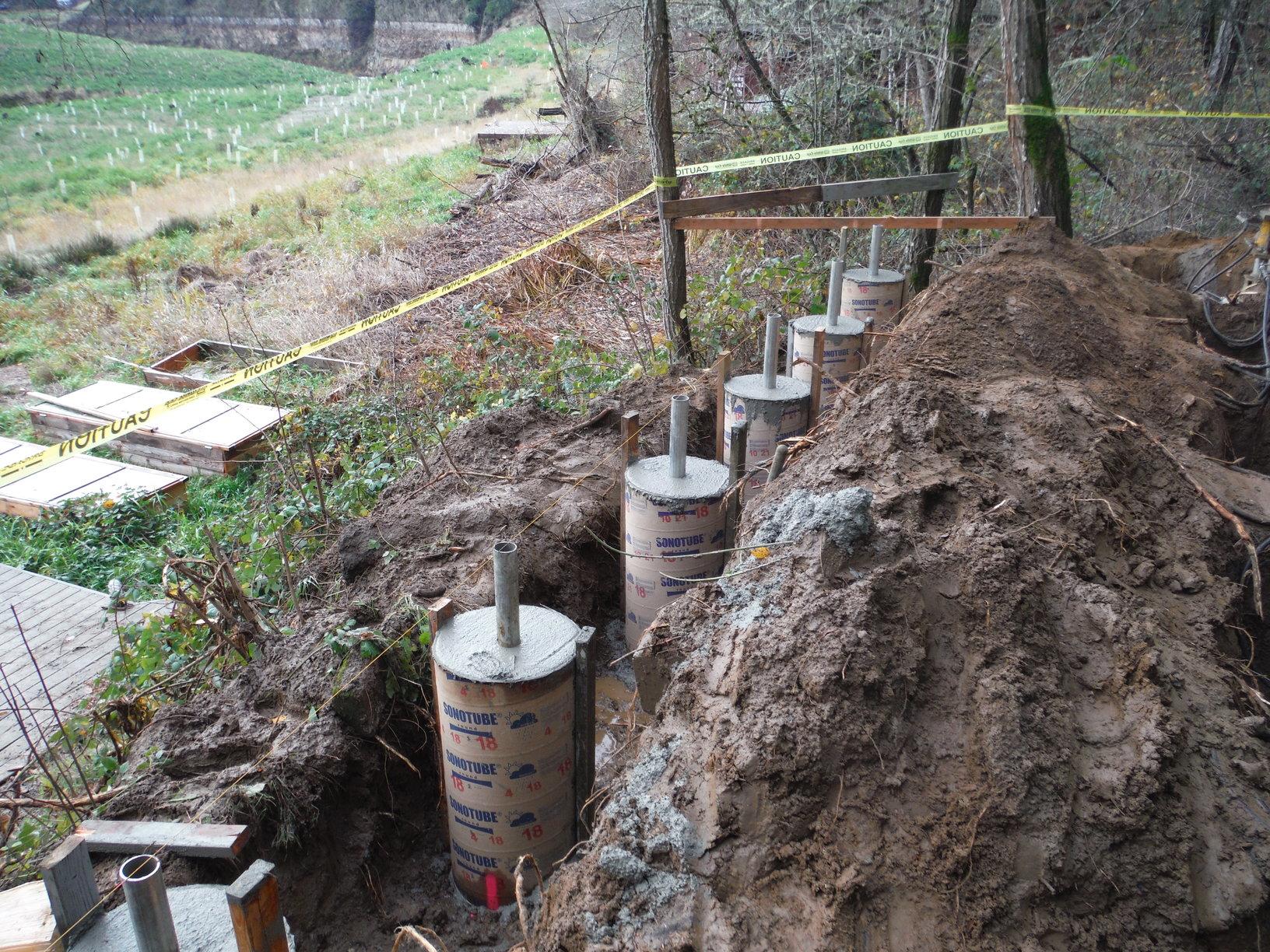 Foundation Repair Evans Helical Pier and Smart Jack System Smart