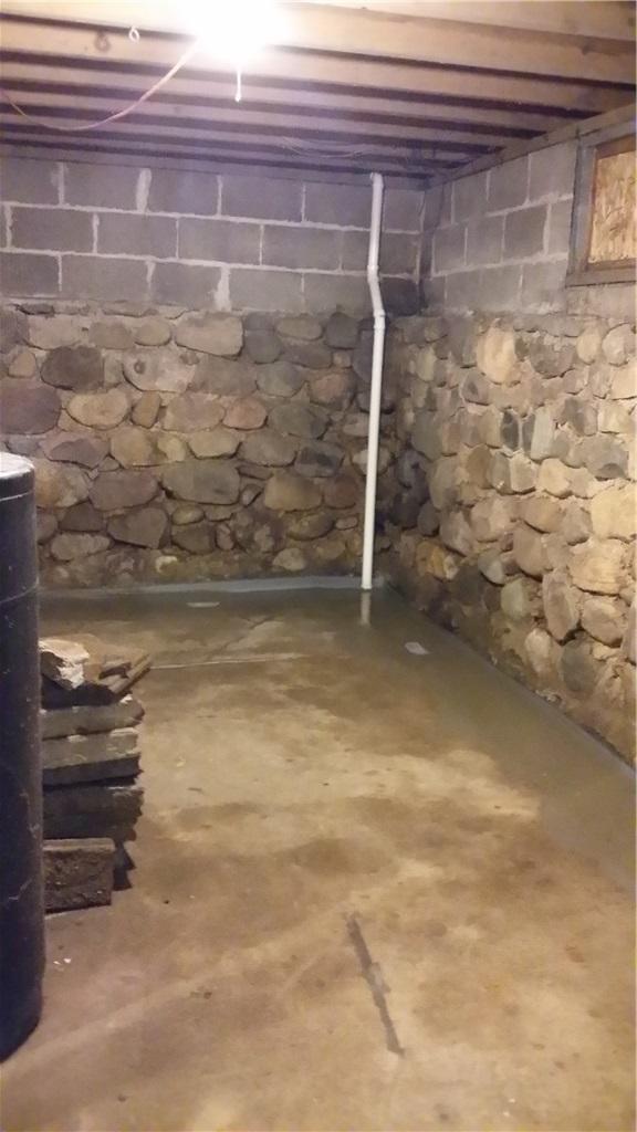 Basement Waterproofing Water From Base Of Stone Walls Remed In Olivet Mi Completed System Goes Virtually Unnoticed Basement Waterproofing Water From, How To Fix A Stone Basement Wall