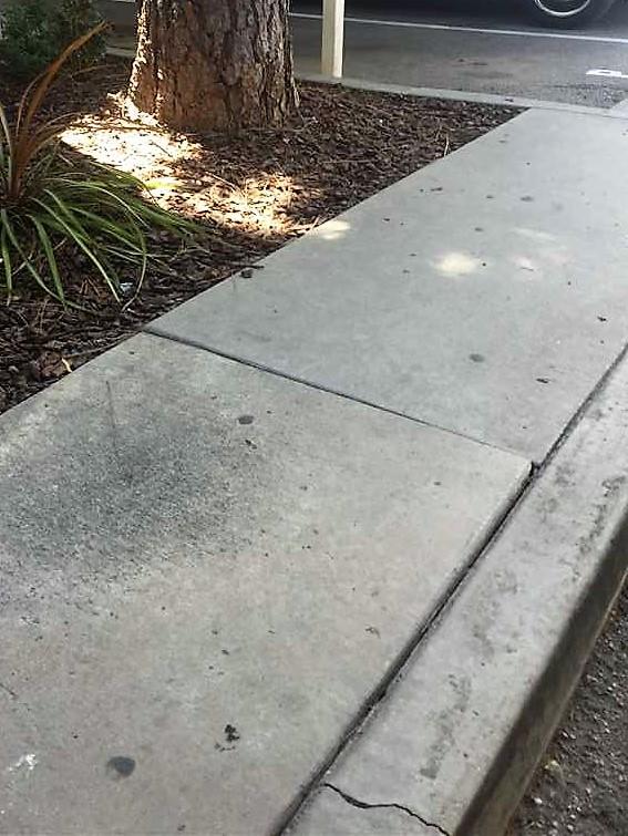 Raised Concrete Slabs at Apartments in Paramount Ca. - Trip Hazard at