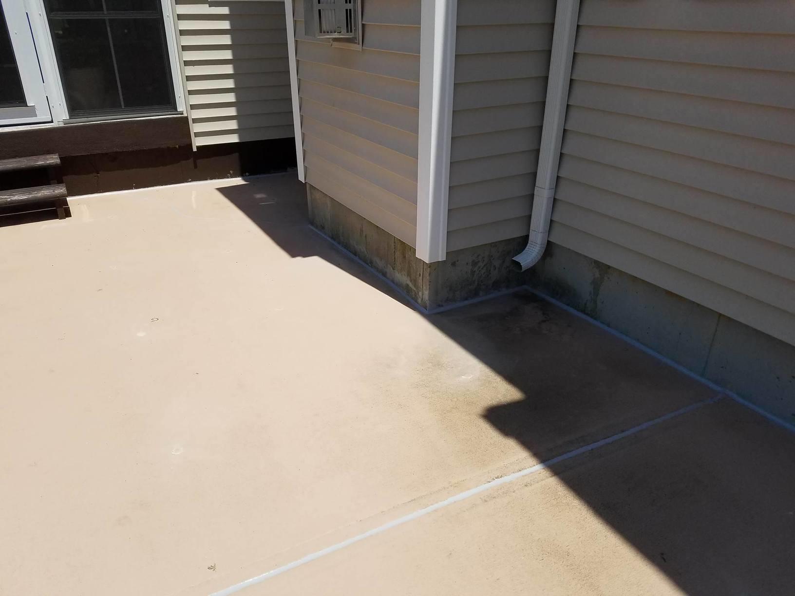 Concrete Lifting and Leveling Patio Slab Sinking in Felton, DE Patio slab is lifted in