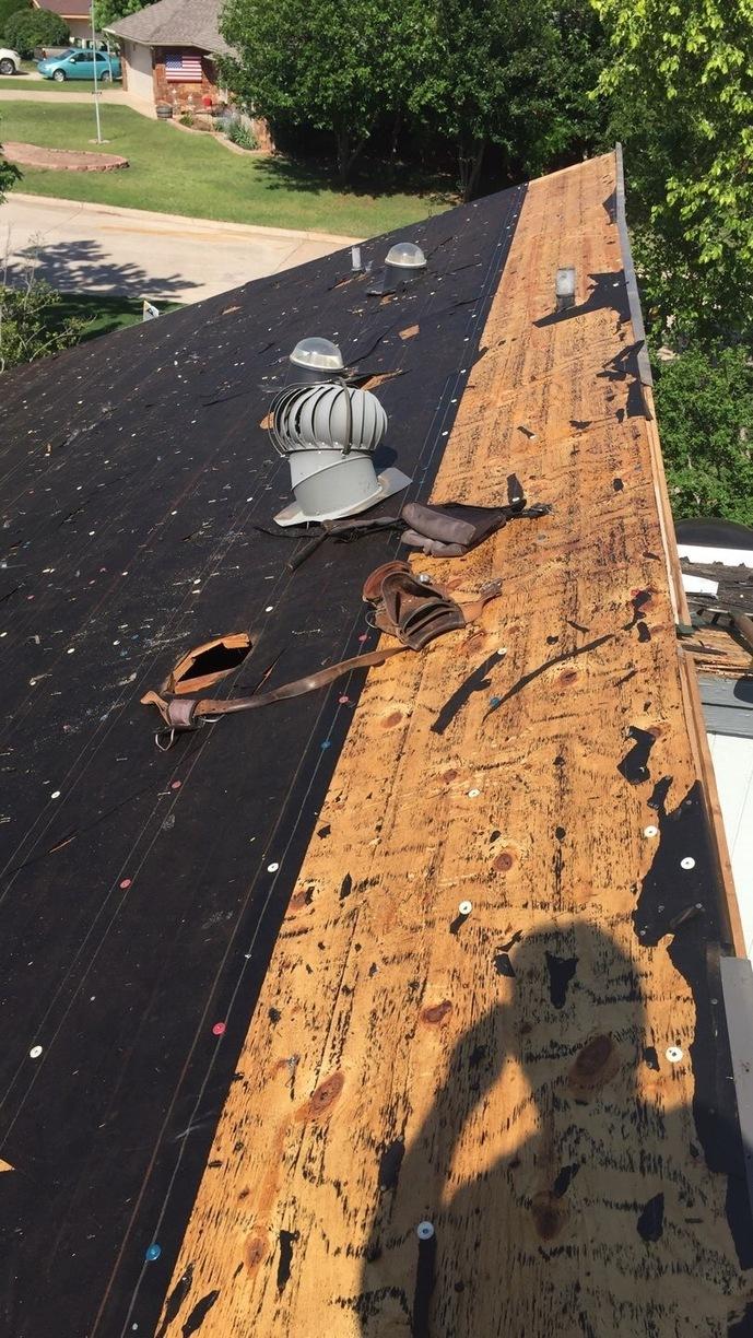 ReRoof, New Gutters & Interior Repairs in OKC Tearing Off Shingles