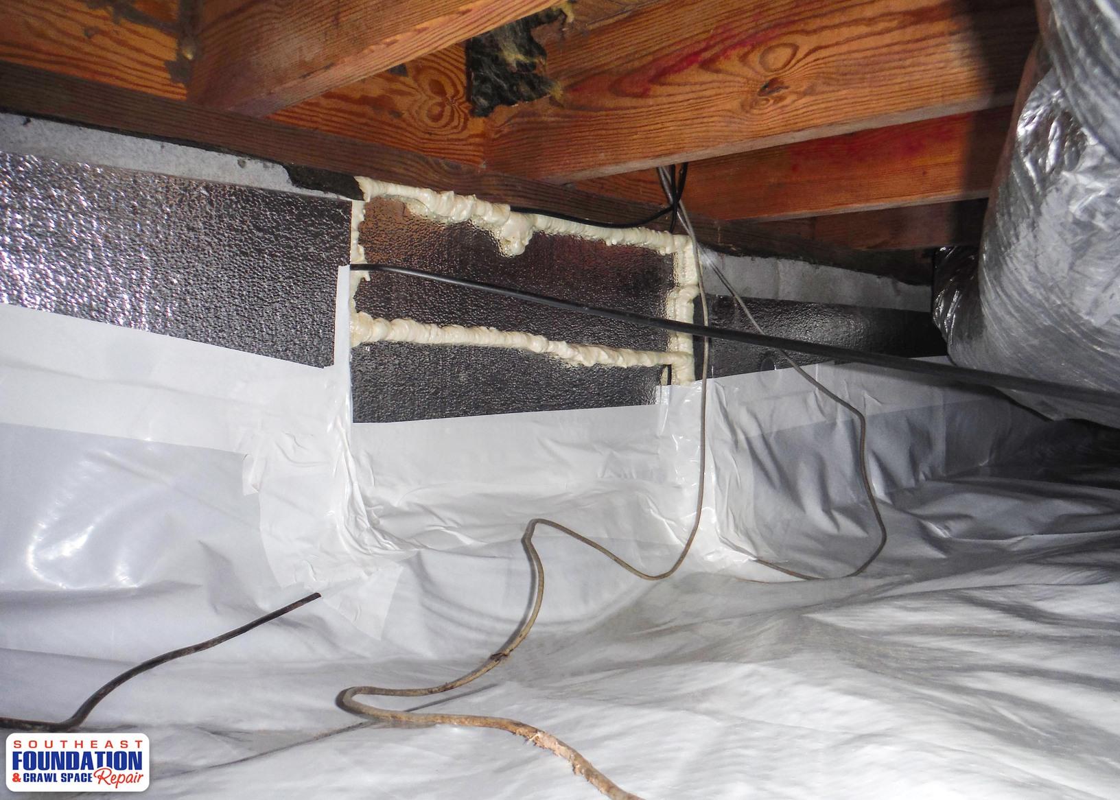 Crawl Space Repair Installing a CleanSpace Encapsulation System in Erwin, NC Sealing off Vents