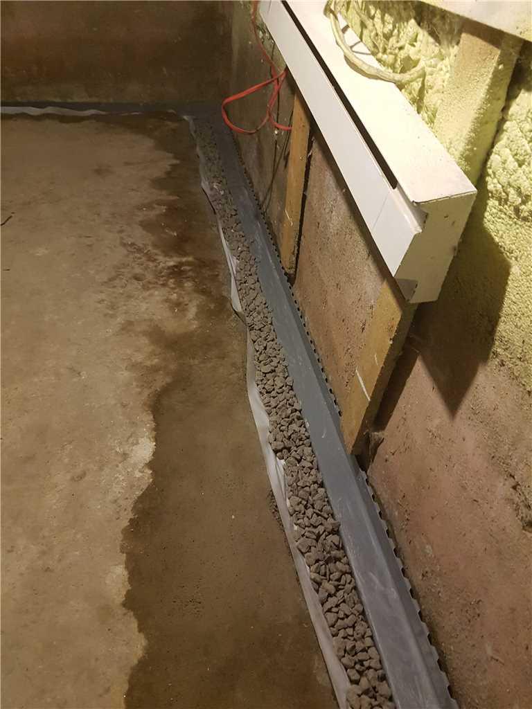 Étanchéisation de soussol à Victoriaville, Québec Installation du drain intérieur