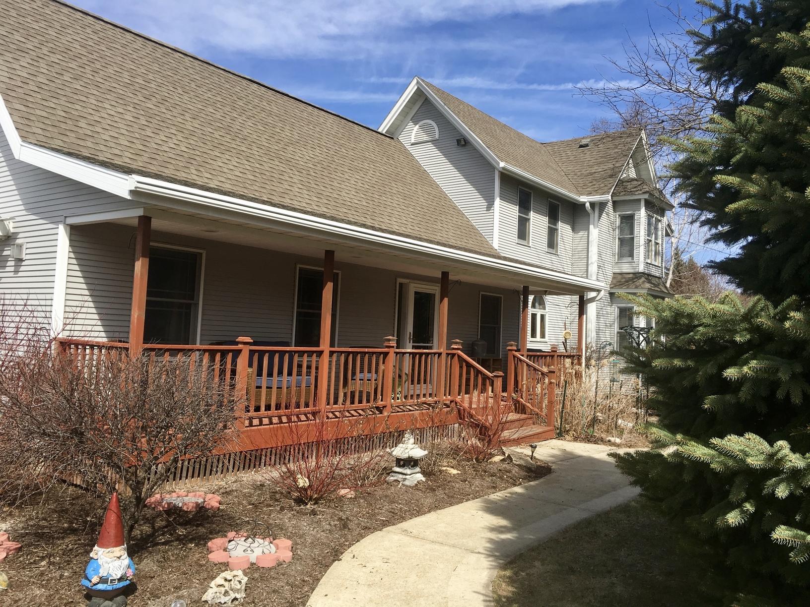 Larson Home Services Gutter Installation Leafguard Addition To A Beautiful Front Porch In Deerfield Wi
