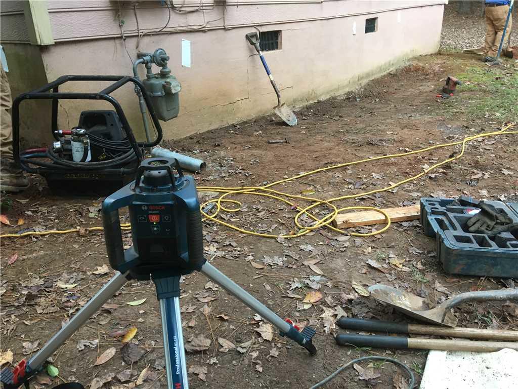 Commercial Foundations Large Cracks Closed with Push Piers in Macon