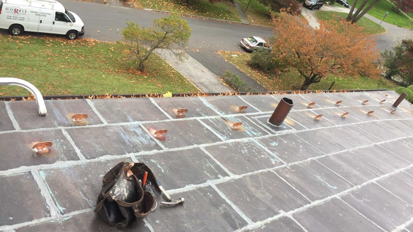 Snow Guards Installed for a custom Copper Roof New Copper Snow Guards
