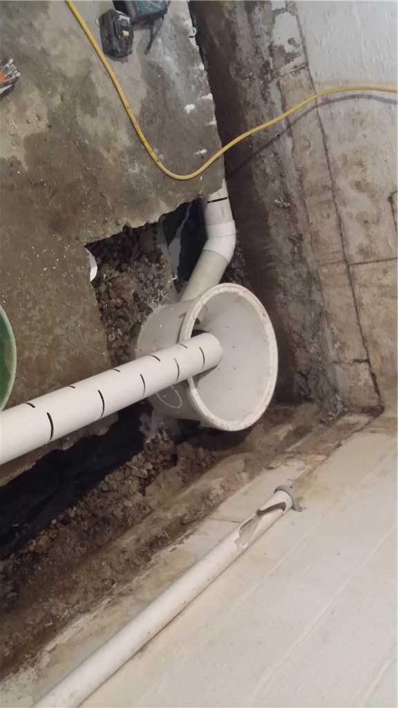 Basement Waterproofing Cross Tile Installation in