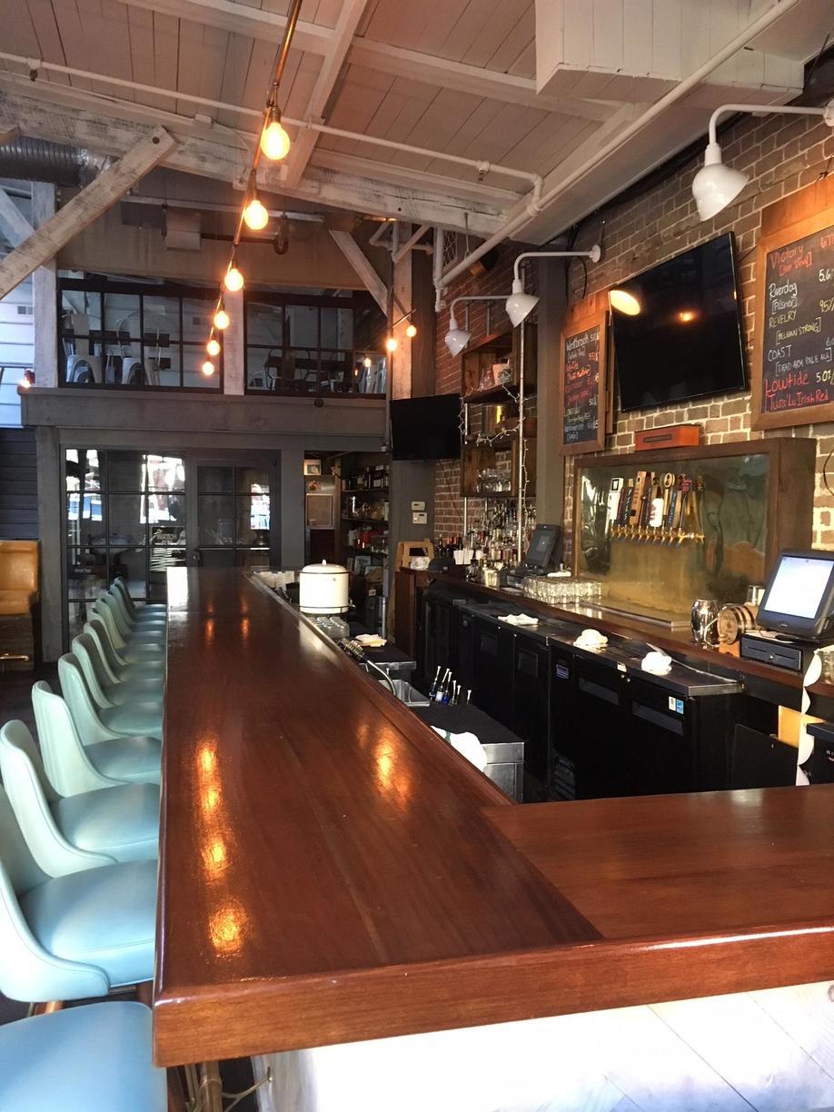 Wine Bar Gets Converted to a Smokehouse Restaurant Remodel in