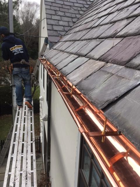 Gutters Downspouts Installing Copper Gutters On A Slate Roof In Somerville Ma Installed Copper Gutters