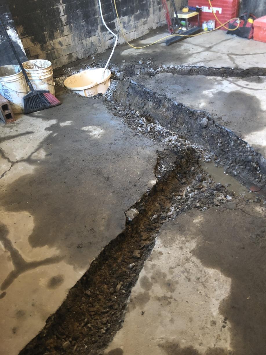 Cracks in Floor Causing a Leaky Basement in Utica, KY Beginning of
