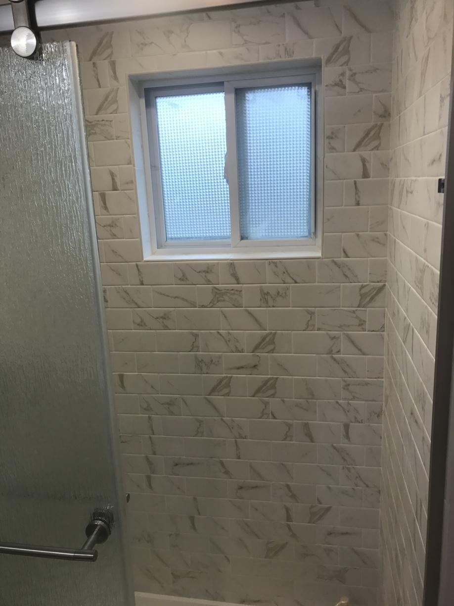 Bathroom Remodel in West Islip, NY Bathroom Window and Tiled Wall