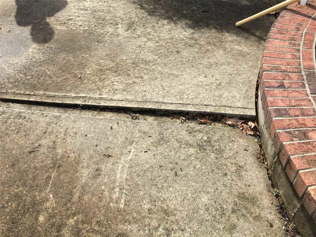 Concrete Lifting and Leveling Concrete Slab Sinking 2 Inches in