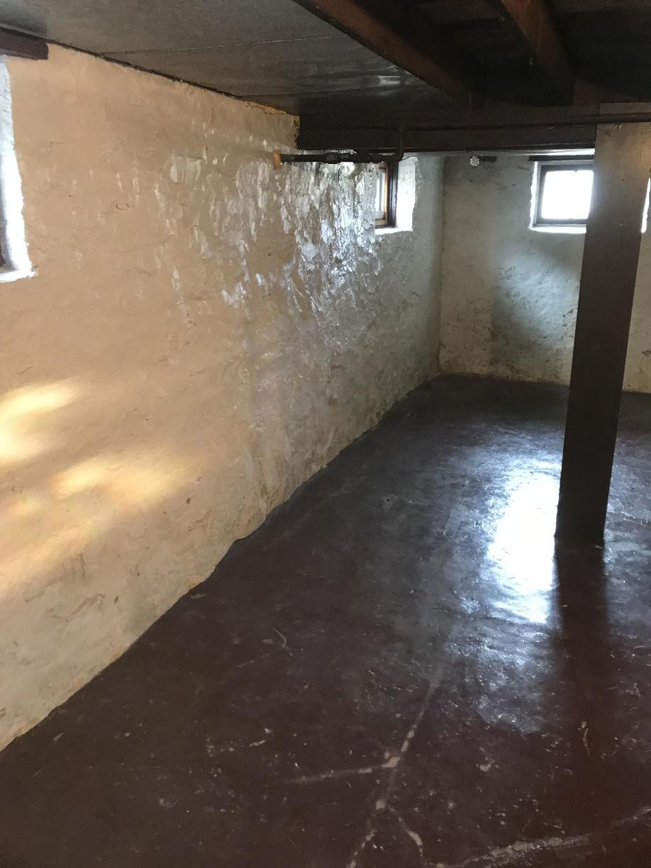 Basement Waterproofing Wet Basement in Duluth, MN finally gets fix wall