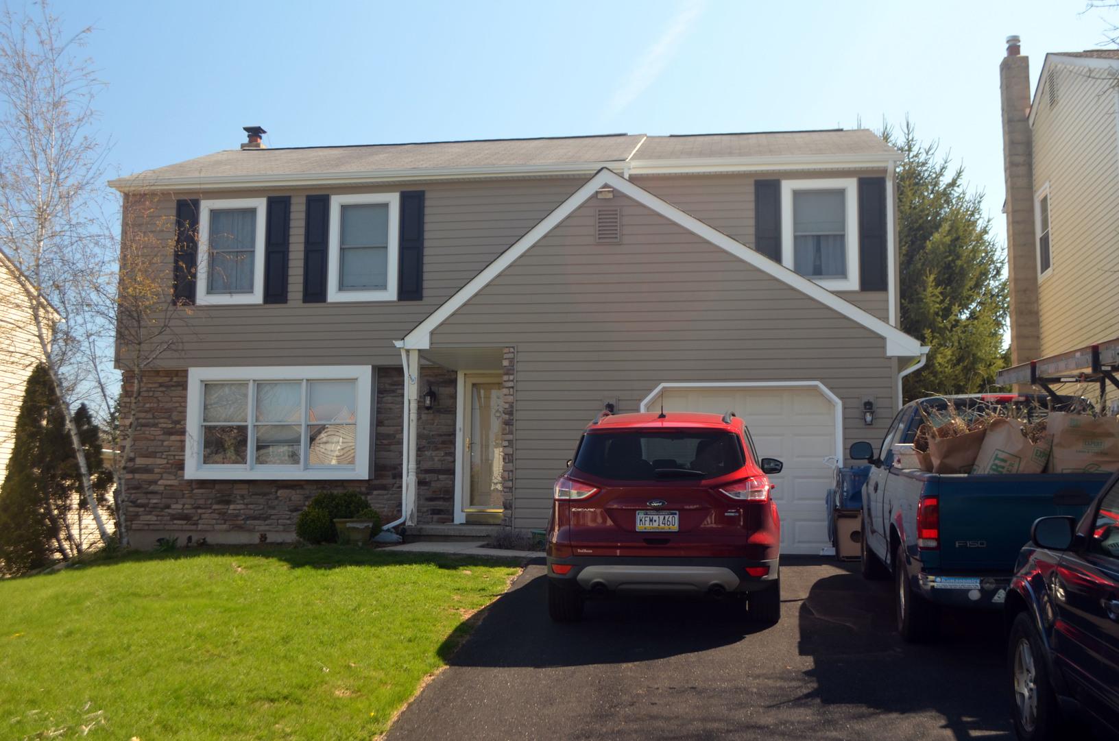Siding Colonial Ivory Globaltech Insulated Vinyl And Provia Osage Ledgestone Stone Siding Installation In Horsham Pa Colonial Ivory Globaltech Insulated Vinyl And Provia Osage Ledgestone Stone Siding Installation In Horsham Pa