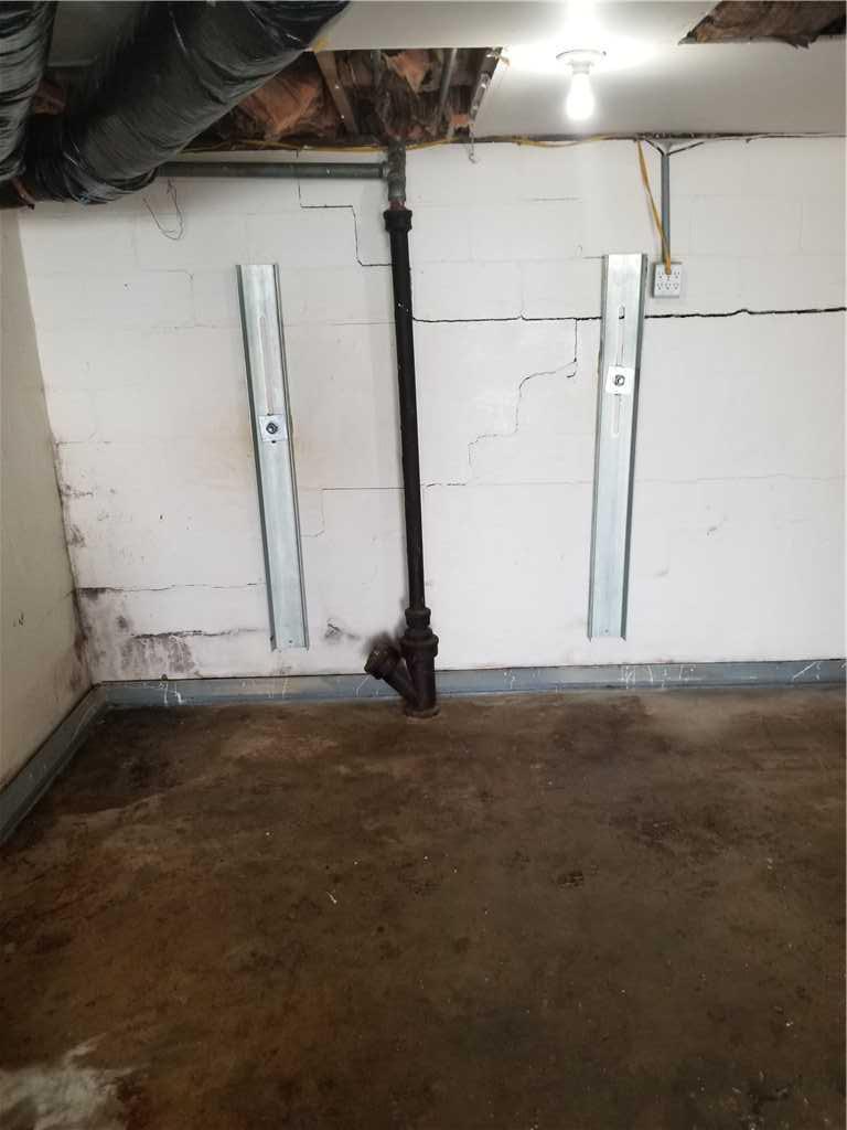 Foundation Repair GeoLock Wall Anchors in High Ridge, MO Rental Property Geo_Lock Wall Anchors