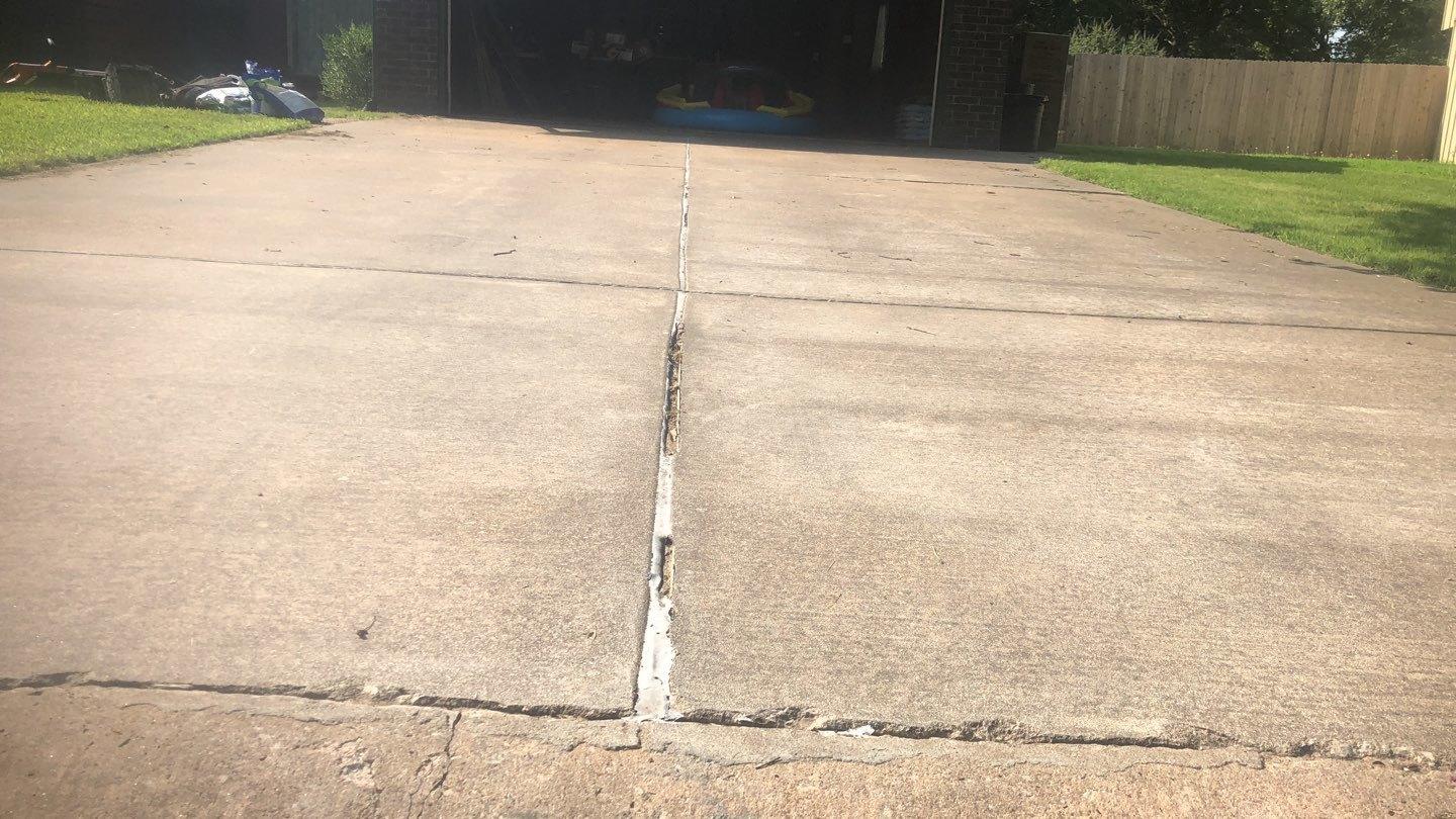 Driveway Repair in Enid, Ok Uneven Concrete Driveway in Enid, Ok