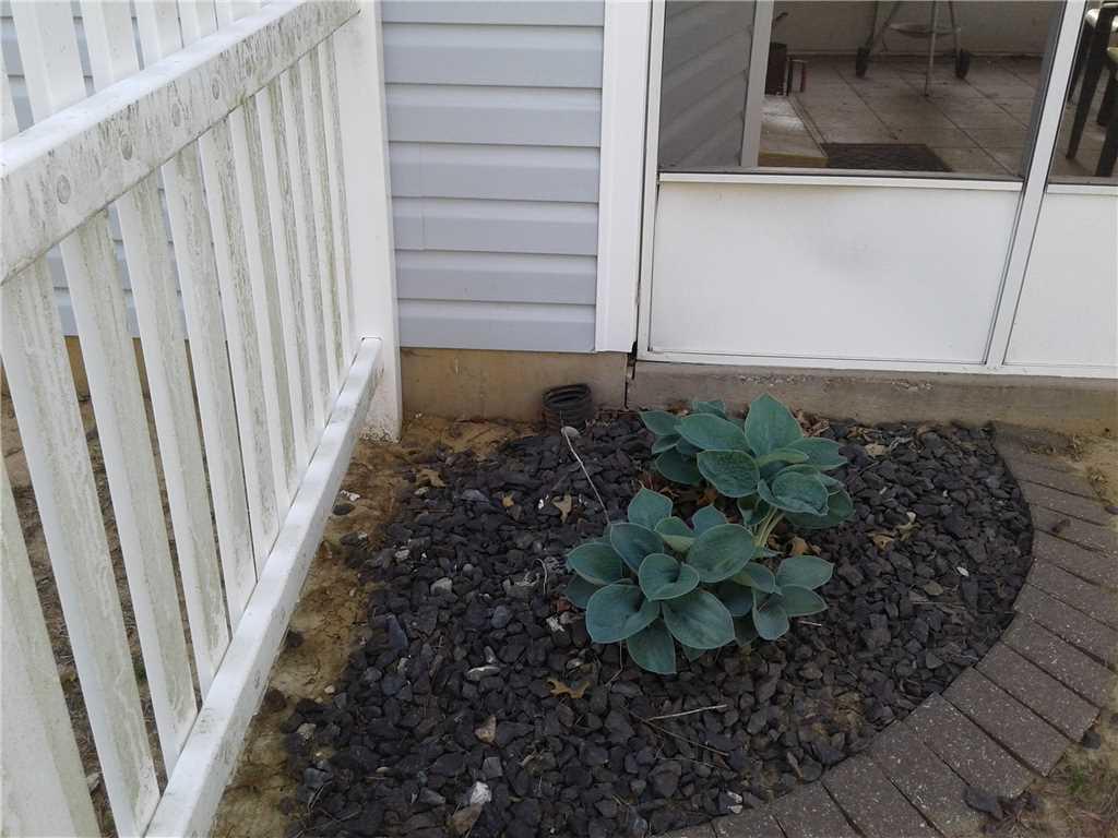 Concrete Lifting and Leveling PolyLevel on Patio Porch in Maryville