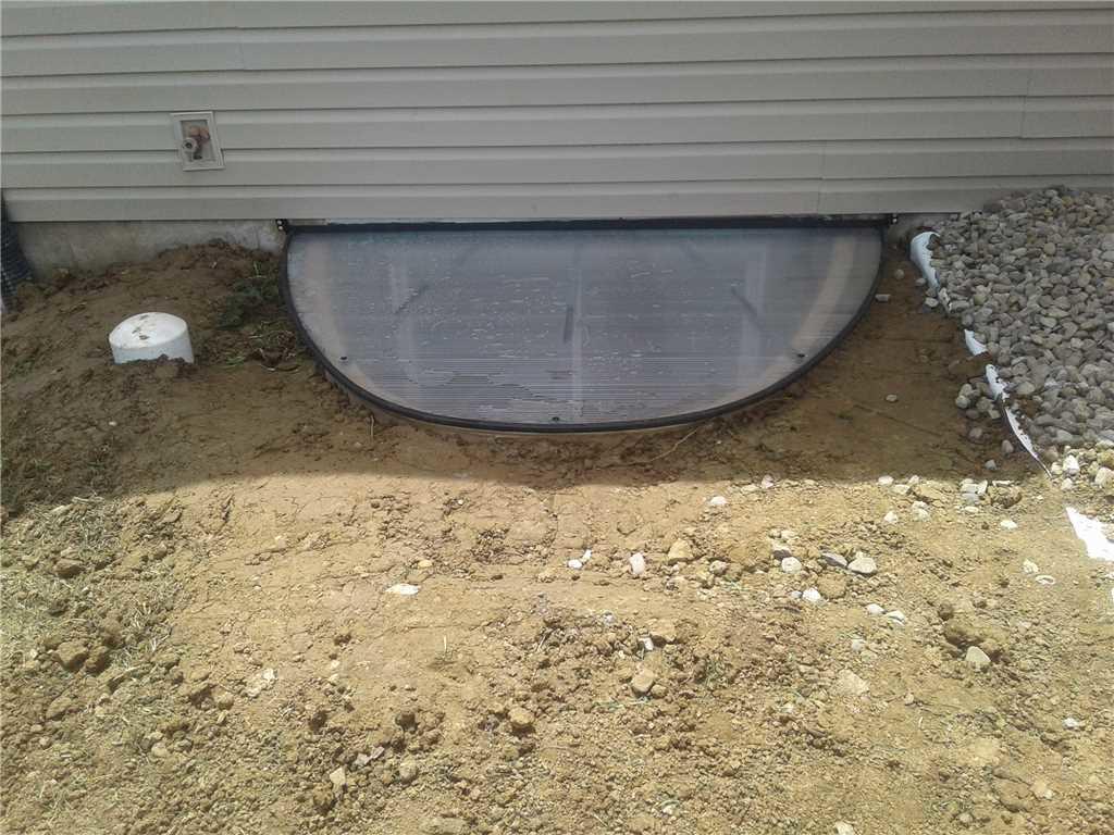 Basement Waterproofing Egress Window With RockWell and Exterior Sump