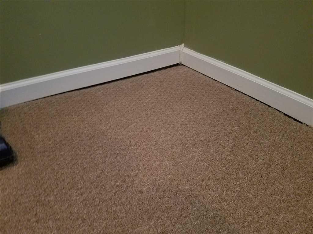 Foundation Repair PolyLevel and Push Piers Raise Hillside Home in