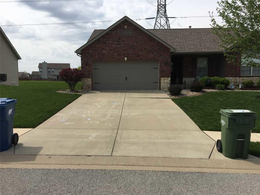 Concrete Lifting and Leveling PolyLevel Revitalizes Concrete Driveway