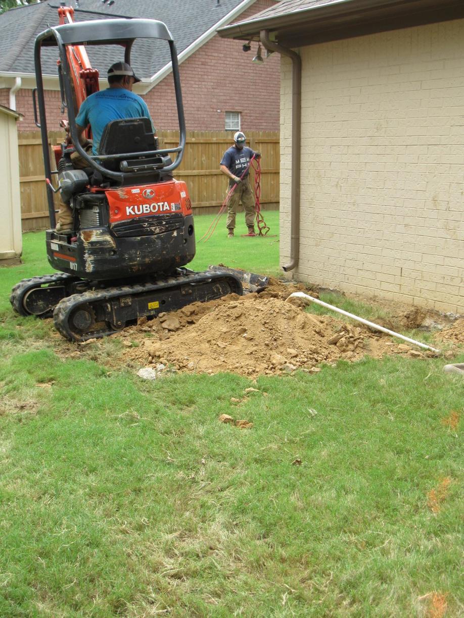 Foundation Repair Push Piers with Jed, Danny, and Juan Move that dirt!