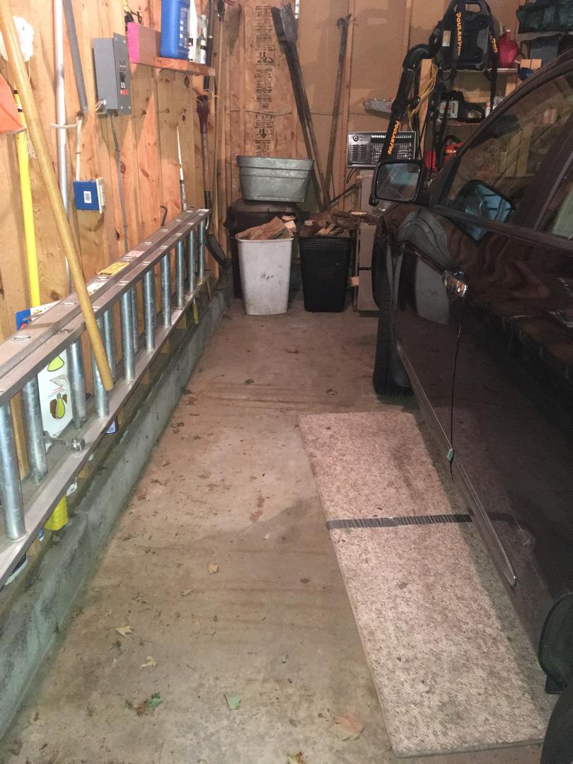 Concrete Lifting and Leveling Wet Garage Repair in Nebagamon, WI