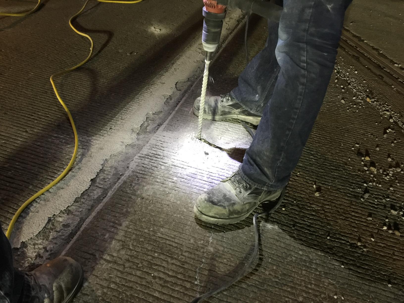 Concrete Lifting and Leveling Interstate or Driveway Drilling through the roadway slab