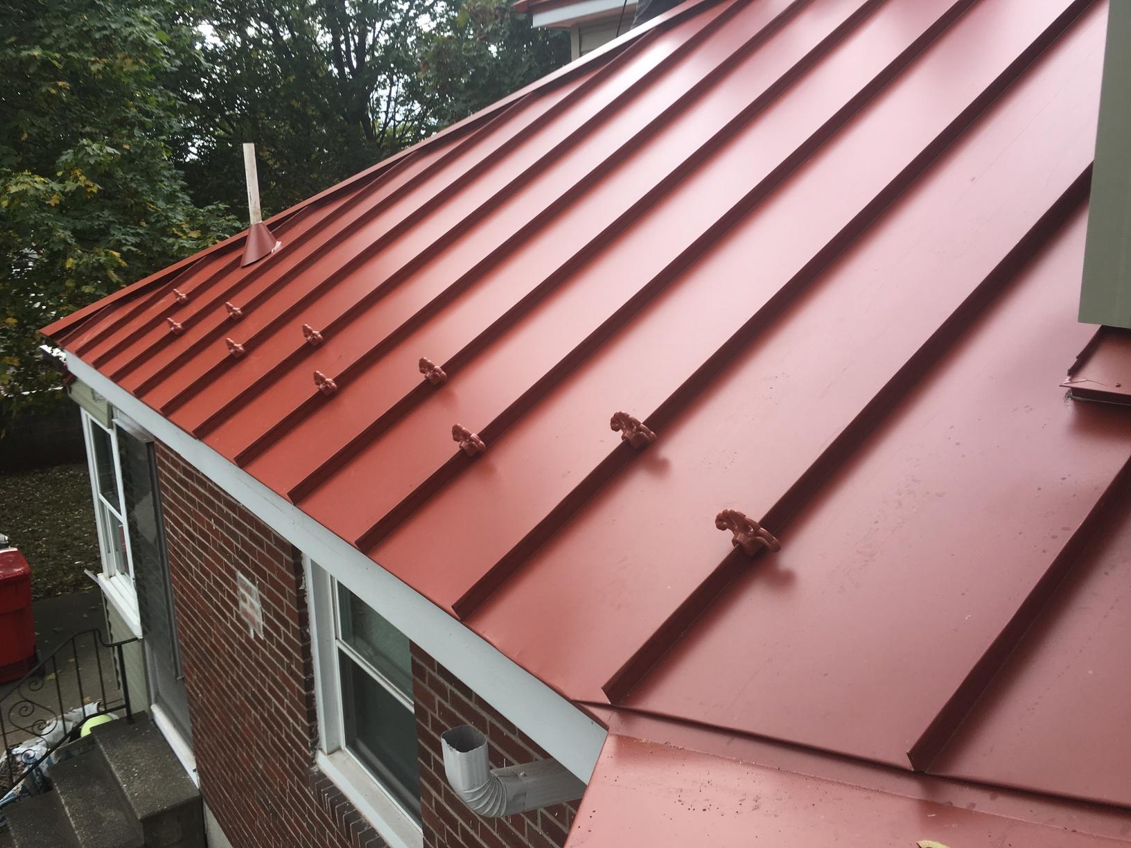 Replacing Asphalt Roof With Terra Cotta Drexel Standing Seam Metal Equipped With Snow Guards And Rainpro Gutters In Pottstown Pa Terra Cotta Drexel Standing Seam Metal Roof With Snow Guards