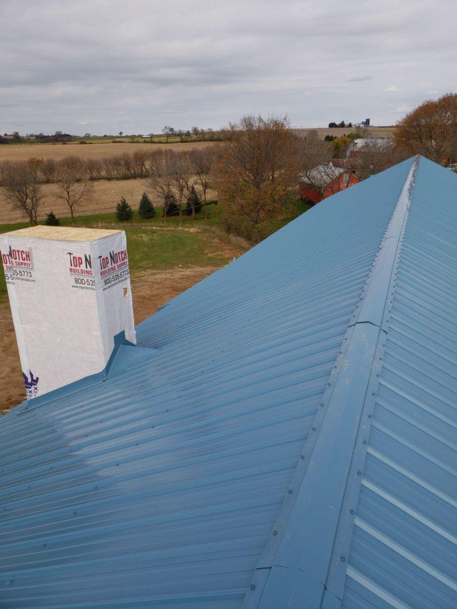 Metal Roofing Metal Roof On New Construction House In Rock City Il Rear Roof Slope