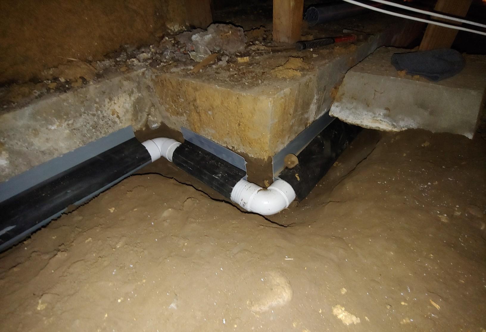 Sump Pumps Installing a crawlspace Smart Pipe and Sump Pump system