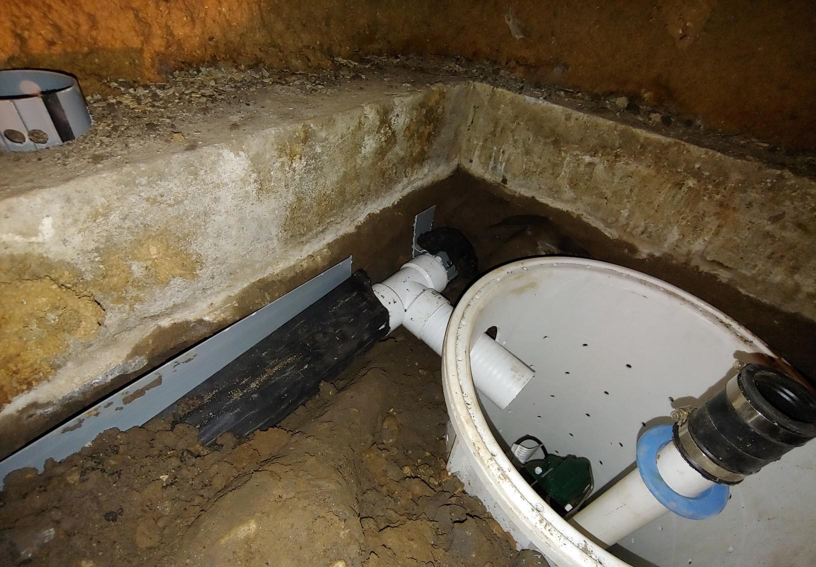 Sump Pumps Installing a crawlspace Smart Pipe and Sump Pump system