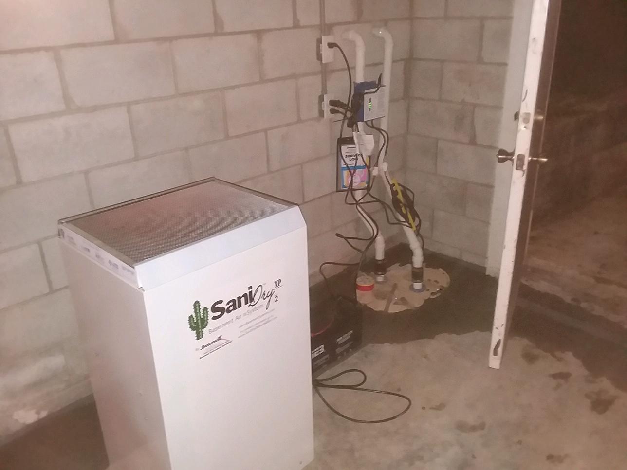 WaterGuard, SuperSump pump and SaniDry resolve basement water problems