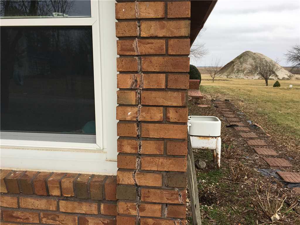 Foundation Repair Shifting Home Supported by GeoLock Foundation Repair Shifting Home Supported by GeoLock