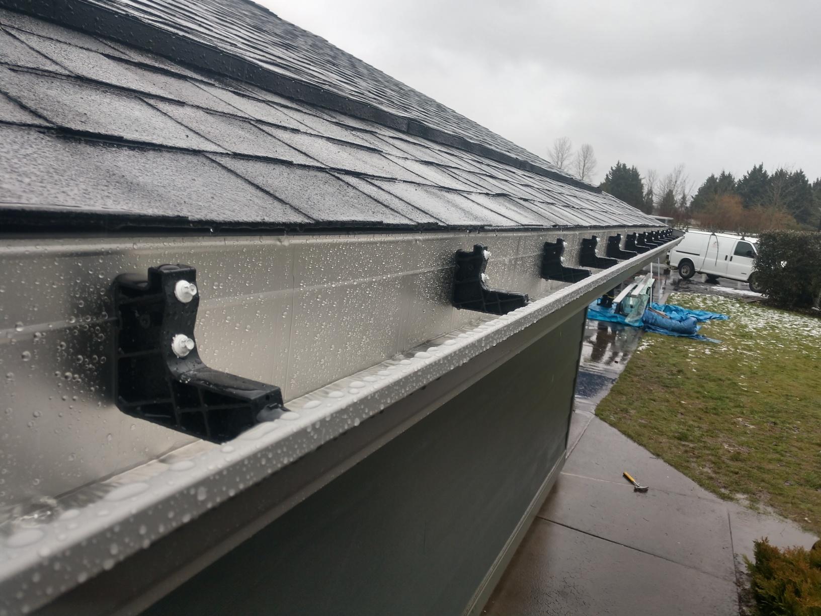 Roof Replacement Vancouver Exterior Remodel Project Gutter Shutter Brackets Installed