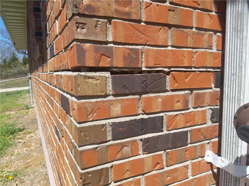 Foundation Repair Badly Pitching Foundation Righted With Push Piers