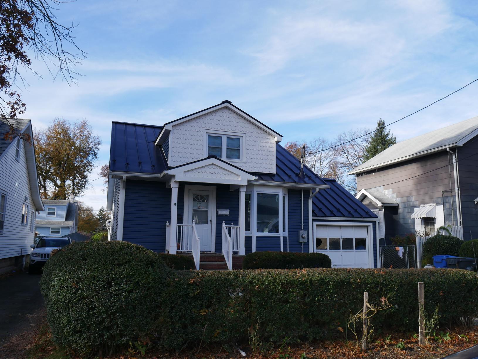 Installing Charcoal Grey Standing Seam Metal Roof On Cape Cod Style Home In Metuchen Nj Charcoal Grey Standing Seam Metal Roof On Cape Cod Style Home In Nj